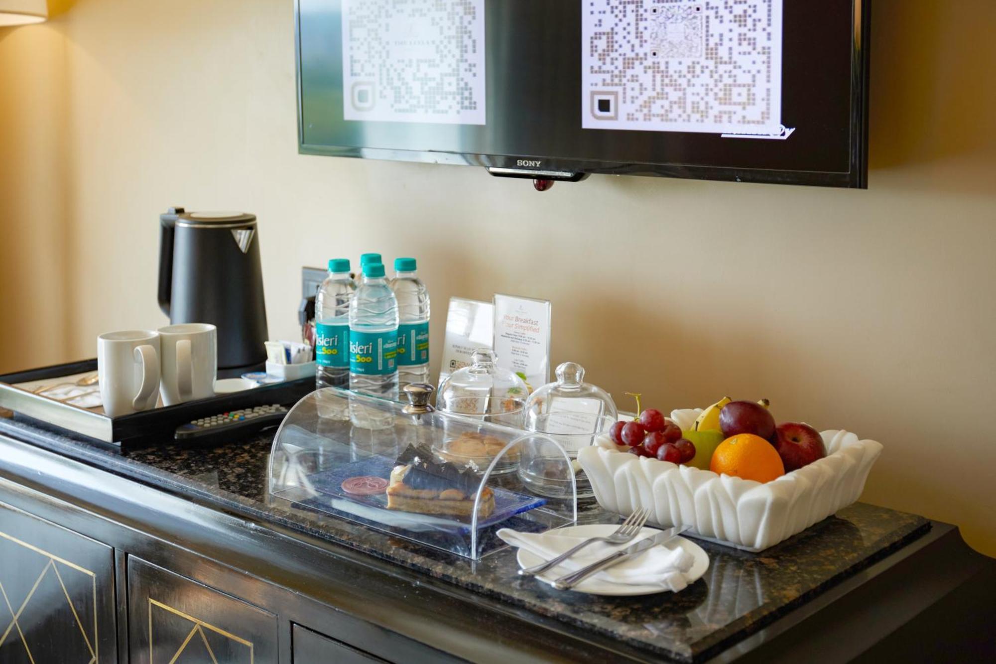 The Leela Mumbai Hotel Exterior photo A hospitality tray in a hotel room