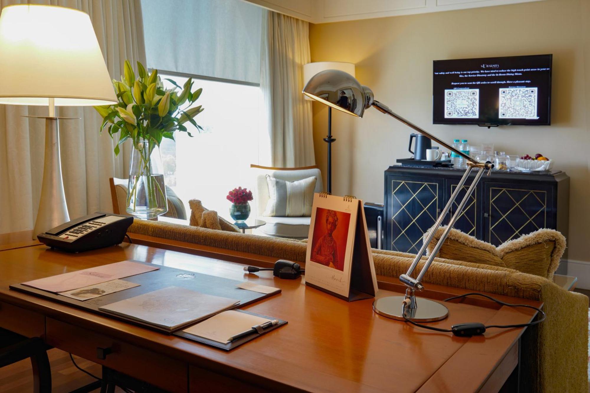 The Leela Mumbai Hotel Exterior photo A desk in a hotel suite